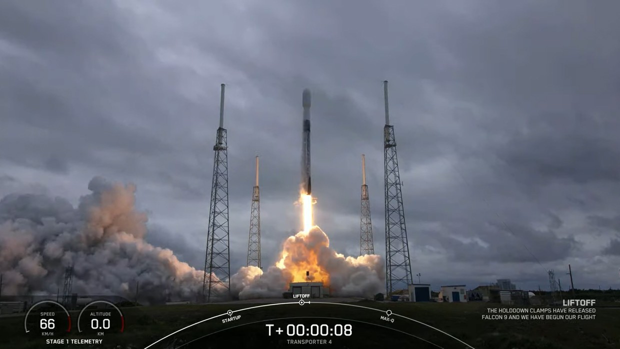 SpaceX launches 40 satellites into orbit, lands rocket at sea