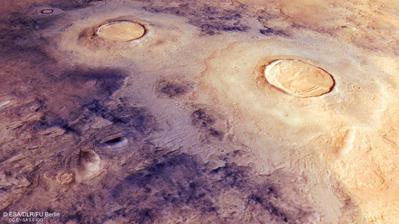 Mars crater complex shows layers of ice in stunning spacecraft photos