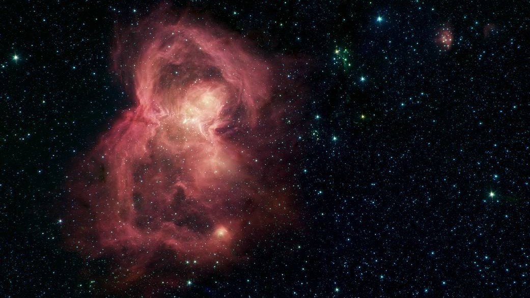 Butterfly Nebula glows red in spectacular image from NASA's Spitzer Space Telescope