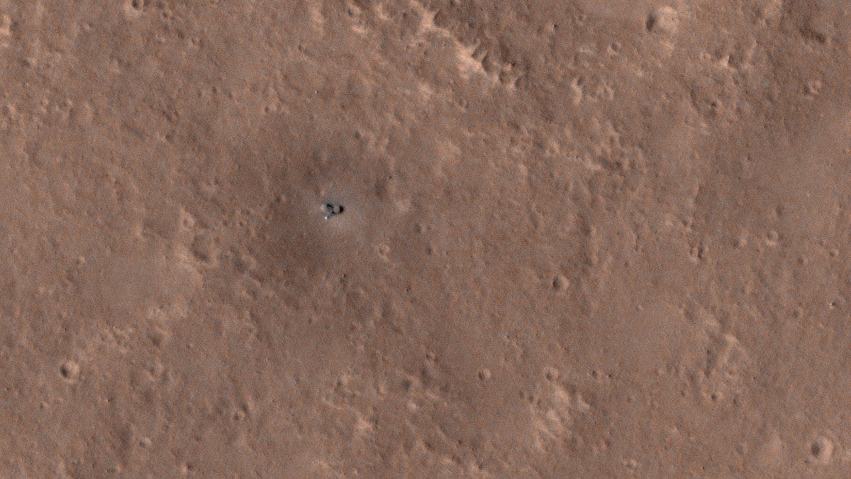 NASA's InSight Mars lander spotted from orbit, covered in dust