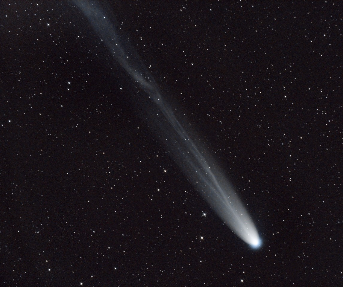 Comet Leonard puts on a final, spectacular display with ion tail in solar wind