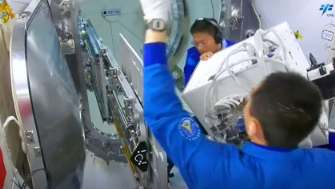 Chinese astronauts install radiation-exposure experiment outside Tiangong space station (video)