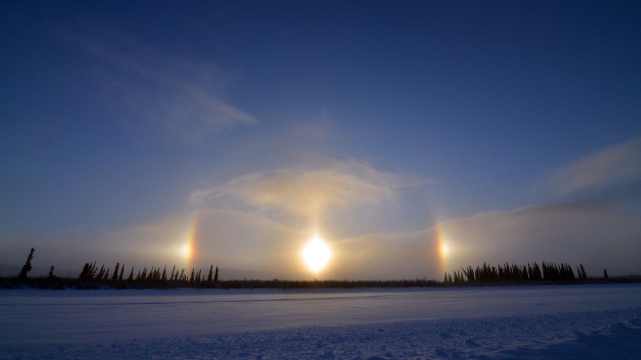 What are sundogs and how do they form?