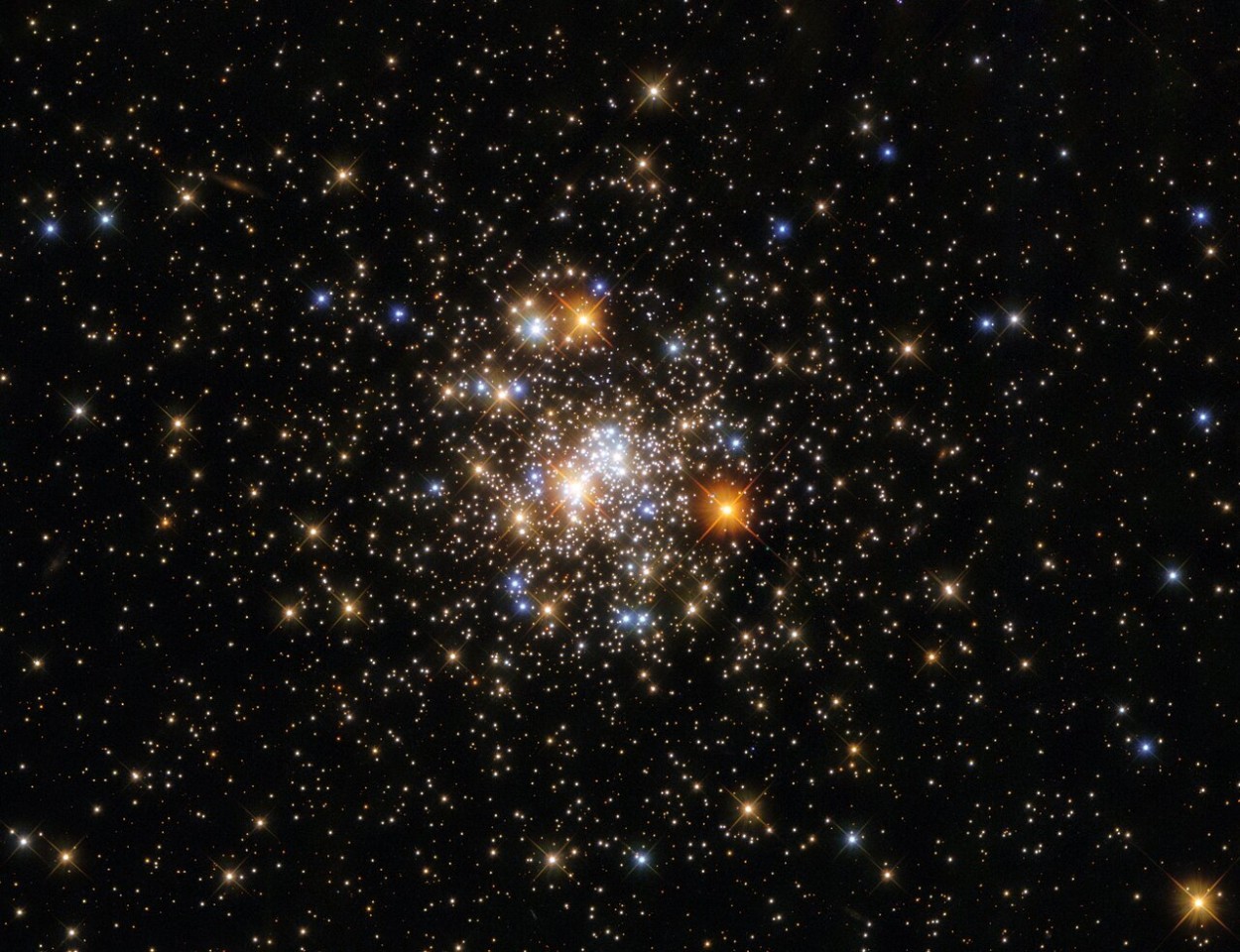 Vibrant globular cluster sparkles in new Hubble telescope photo