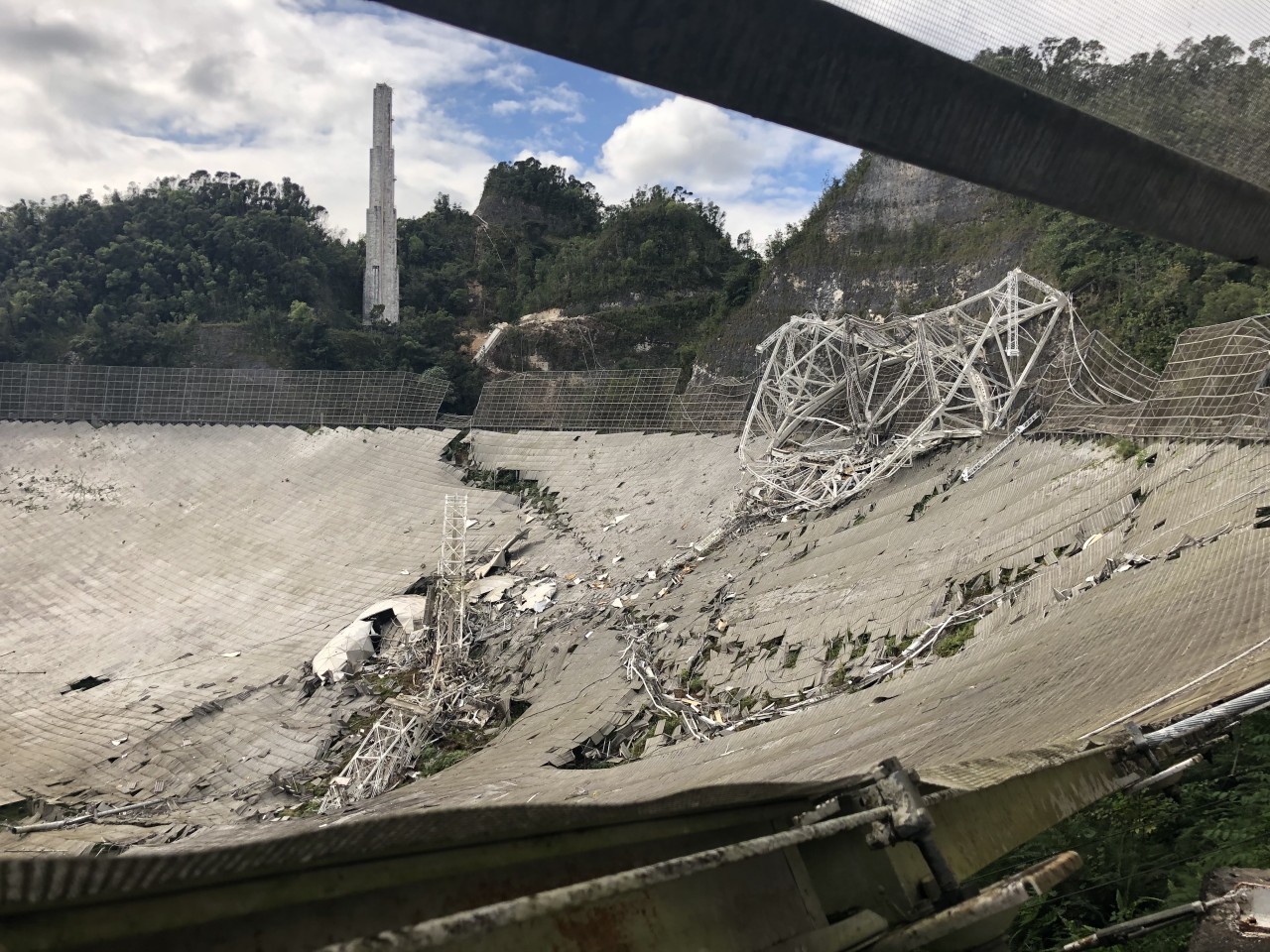 Arecibo Observatory: A year after telescope's collapse, an icon gets continuing cleanup and a new documentary