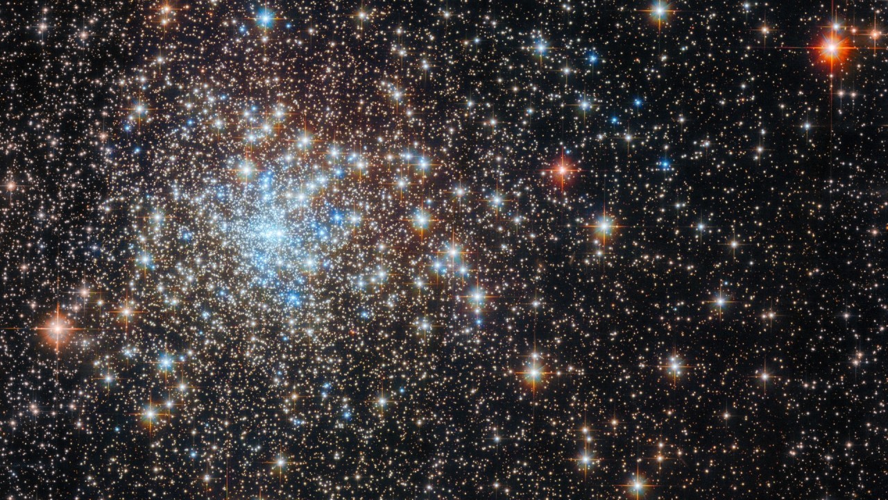 Hubble Space Telescope hunts for a black hole among a brilliant field of stars (photo)