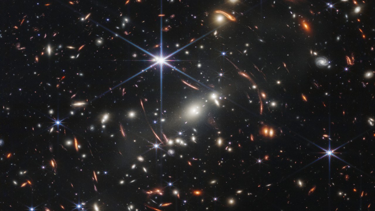 Why do some James Webb Space Telescope images show warped and repeated galaxies?