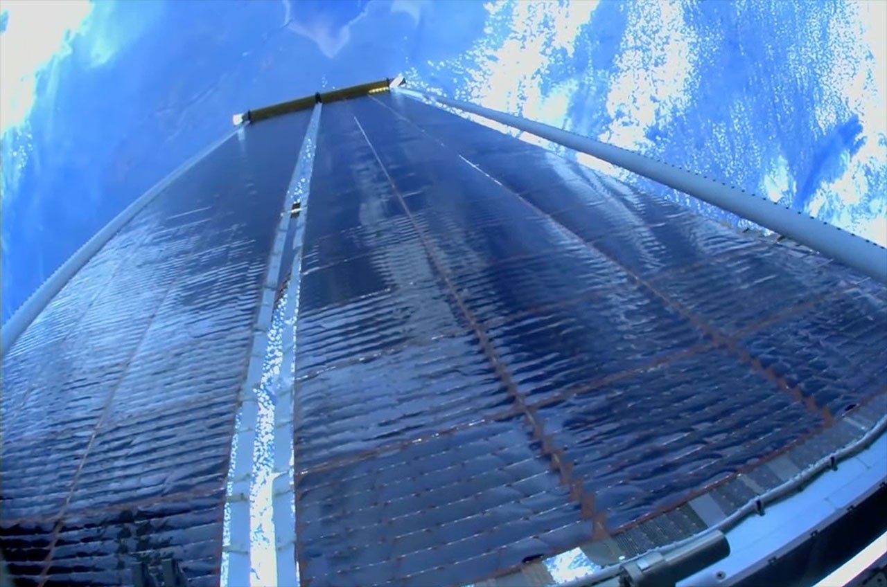 NASA astronauts deploy 5th roll-out solar array on spacewalk outside space station (video)