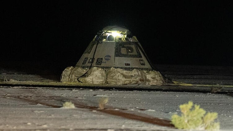 Boeing Starliner capsule lands back on Earth, without astronauts, to end troubled test flight (video)