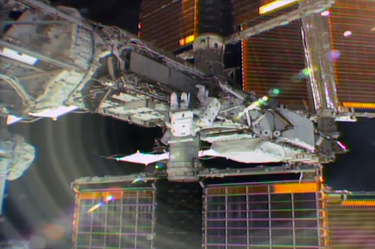 Astronauts prep space station for new solar array on first all-international spacewalk