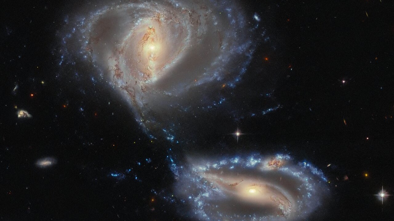 Hubble Space Telescope reveals an unexpected galaxy trio (photo)