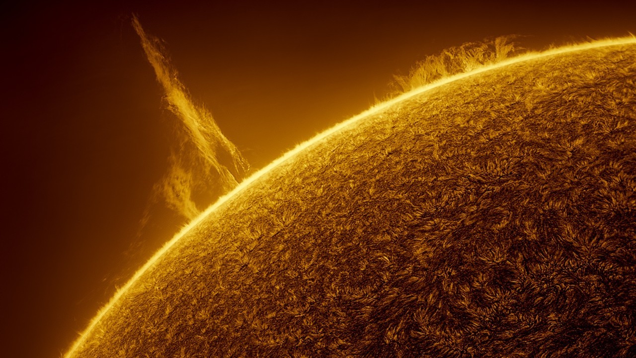 Stunning solar tornado swings into space above the glowing sun (video)