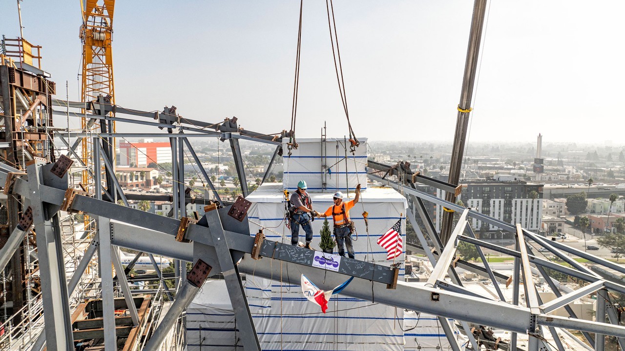 Signed steel beams 'top off' L.A. home for space shuttle Endeavour