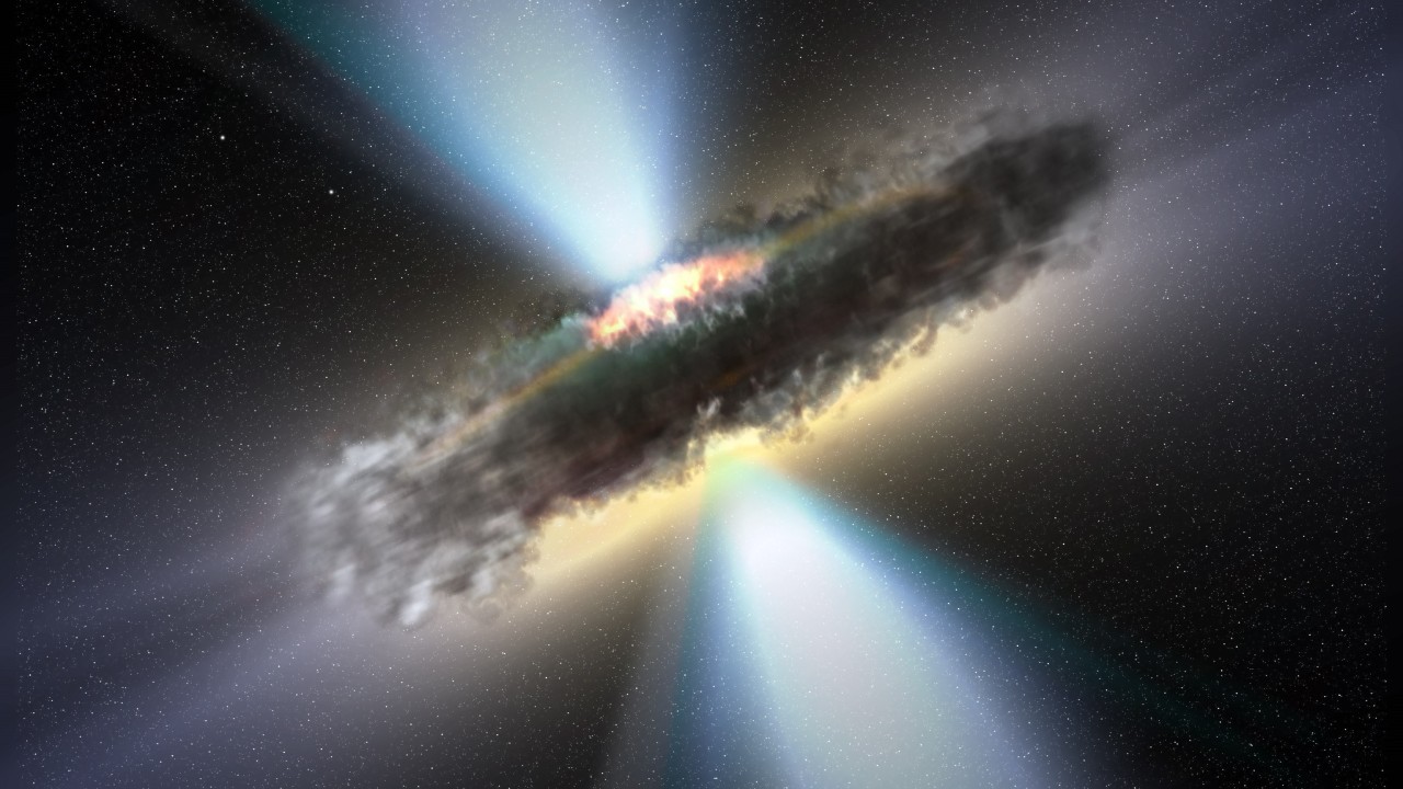 Star-birthing galaxies can hide supermassive black holes behind walls of dust