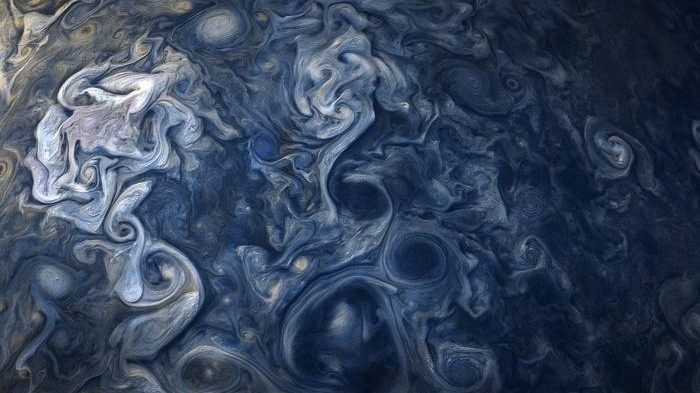 Jupiter's raging gas cyclones may actually mirror Earth's oceans. Here's how