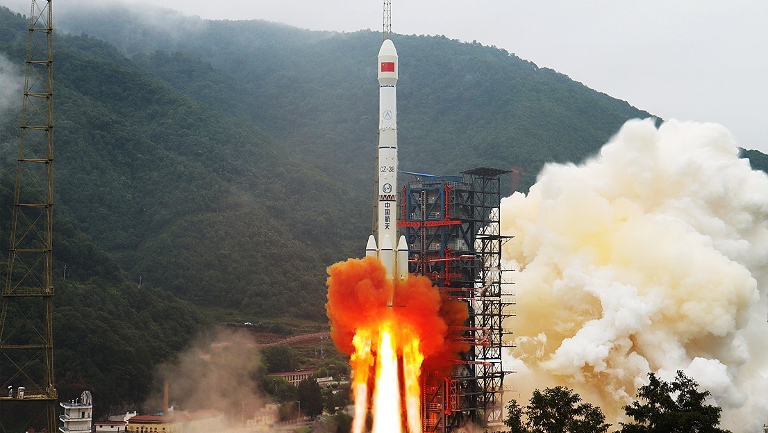 Chinese rocket booster falls from space, crashes near house, after satellite launch: report