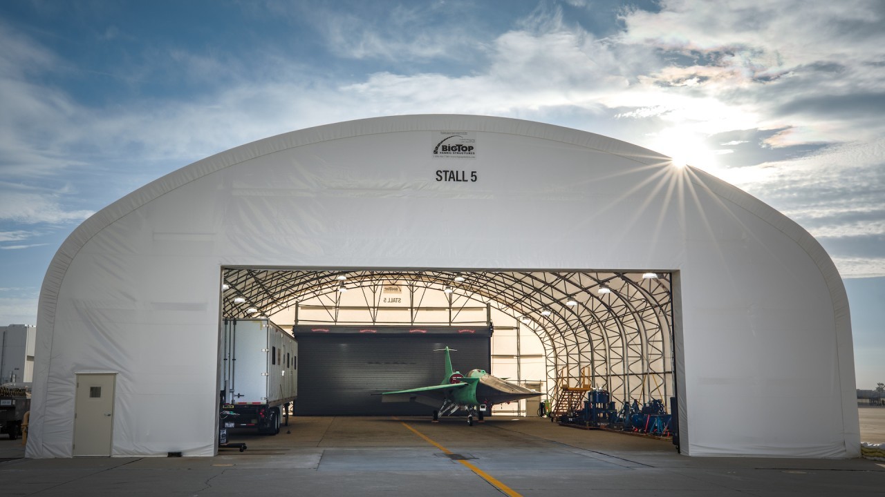 Watch NASA's sci-fi-looking X-59 'quiet' supersonic jet roll out of the hangar (video)