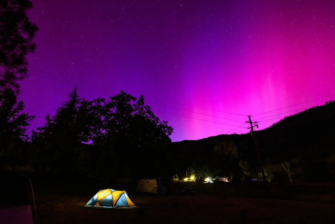 Jaw-dropping northern lights from massive solar flares amaze skywatchers around the world. 'We have a very rare event on our hands.' (photos)